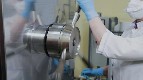 Laboratory staff includes autoclave for sterilization. Stock Footage 119168903