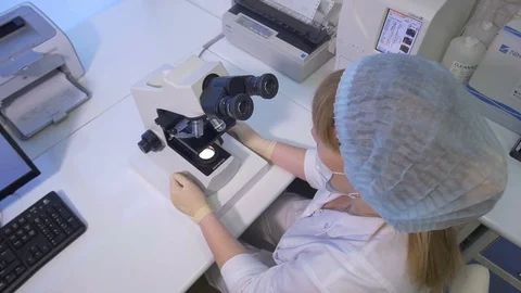 Laboratory studies of blood analysis microscope Stock Footage 73034389
