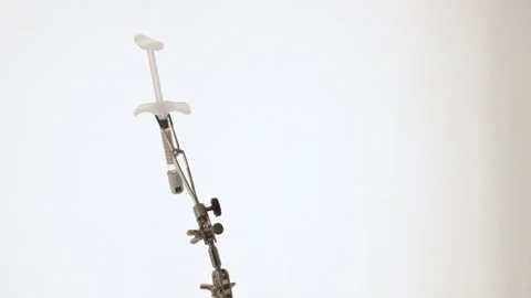 Laboratory Syringe Rotating, Macro Close-Up Stock Footage 317496114