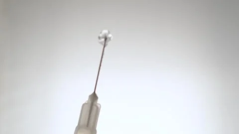Laboratory Syringe Rotating, Macro Close-Up Stock Footage 317496646