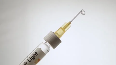 Laboratory Syringe Rotating, Macro Close-Up Stock Footage 317496651