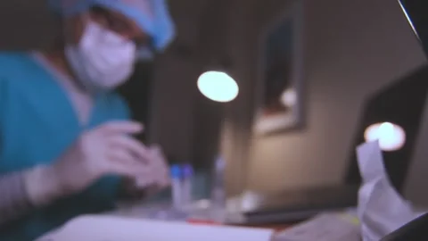 Laboratory technician analyzing a blood sample vial Vídeo Stock 334861819