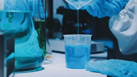 A laboratory technician makes microscopic bacteriological examination with .. Stock Footage 336485683