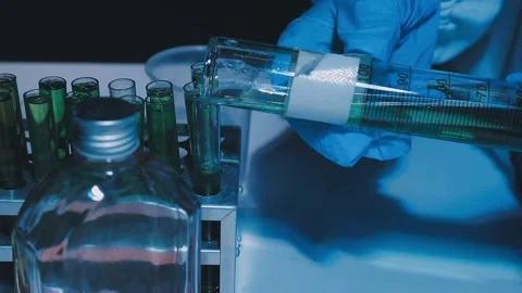 A laboratory technician makes microscopic bacteriological examination with .. Stock Footage 336485768