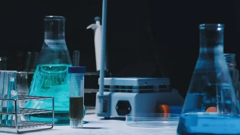 A laboratory technician makes microscopic bacteriological examination with .. Stock Footage 336485771