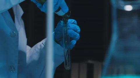 A laboratory technician makes microscopic bacteriological examination with .. Stock Footage 336485775
