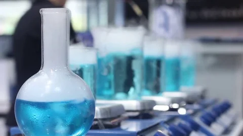 Laboratory test samples in flasks Stock Footage 73387659