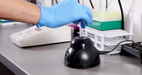 Laboratory test with vortex mixer Stock Footage 172398166