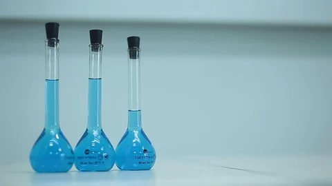 Laboratory testing of chemical reagents. Stock Footage 127777430