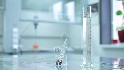 Laboratory testing of chemical reagents. Stock Footage 127778136