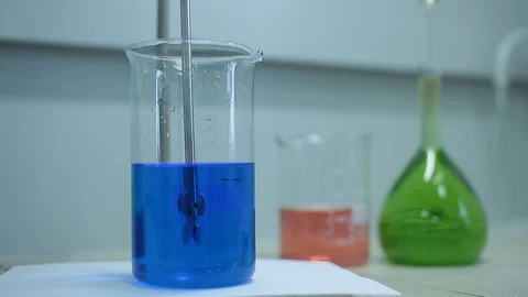 Laboratory testing of chemical reagents. Stock Footage 127778345