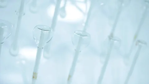 Laboratory testing of chemical reagents. Stock Footage 127778542