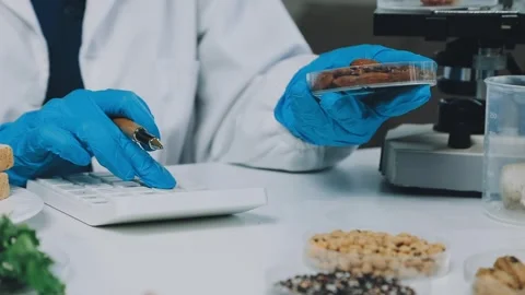 Laboratory testing of different food products. Selective focus.. Stock Footage 319817254