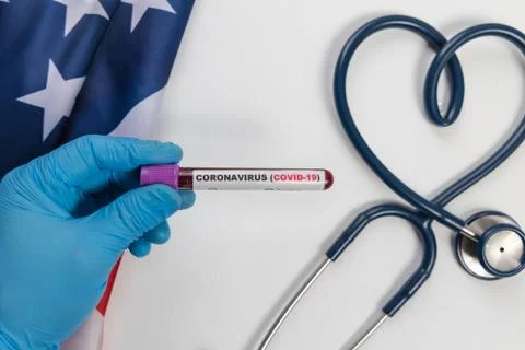 Laboratory testing patients blood samples for presence of coronavirus (COVID- Stock Photos