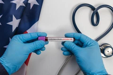 Laboratory testing patients blood samples for presence of coronavirus (COVID- Stock Photos