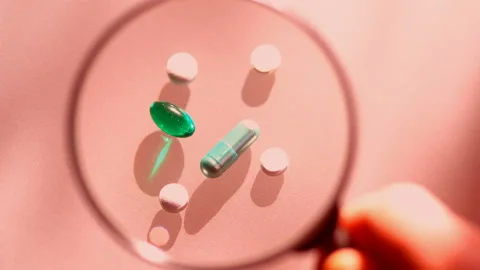 Laboratory tests. Pills lying on the table. Close-up on medicines Stock Footage 86371450