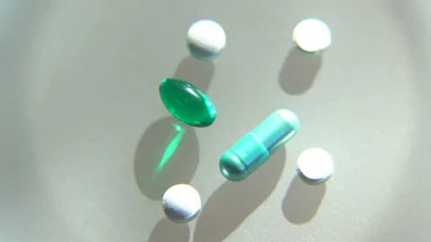 Laboratory tests. Pills lying on the table. Close-up on medicines Stock Footage 87014361