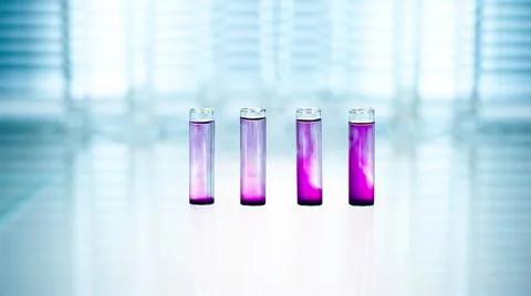 Laboratory. The tubes purple liquid dripping pipette blue solution. Stock Footage 61272241