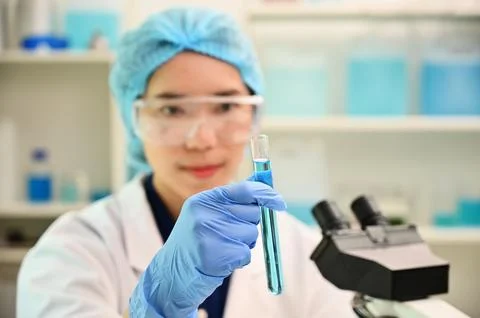 Laboratory woman lab microscope testing doctor technology analysis health c.. Stock Photos