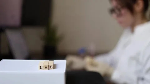 Laboratory worker analyzes research data Stock Footage 337571447