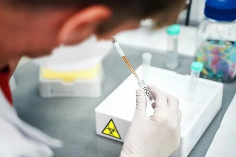 Laboratory worker developing coronavirus vaccine, closeup Stock Photos