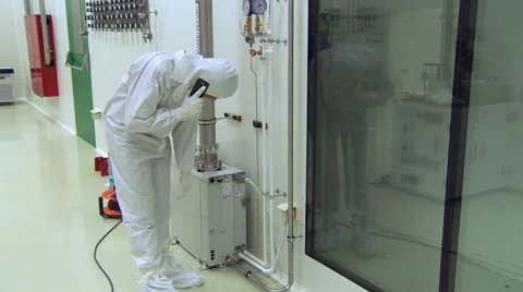 Laboratory Worker Having a Break For the Phone Call. Man Walking Around Stock Footage 67456745