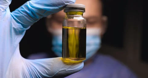 Laboratory worker scientist laboratory assistant tests chemicals for reactions Stock Footage 108756378