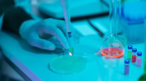 Laboratory Worker Using a Pipette Stock Photos
