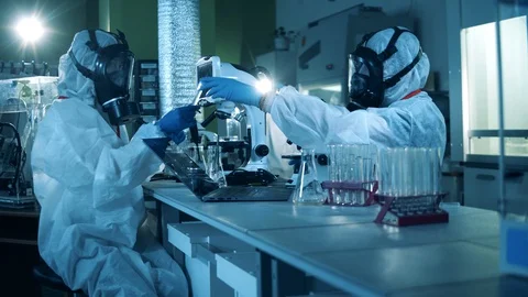 Laboratory workers develop a vaccine for coronavirus. Covid19, coronavirus Stock Footage 128839668