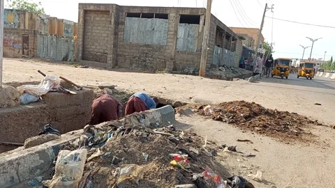 Laborers Clearing Blocked Drainage By Roadside Kano Nigeria Stock Footage 331071062