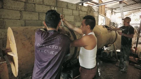 Laborers Preparing Drum Mills To Work At A Factory Stock Footage 94736644