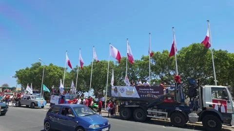 Labour supporters gather in Valletta with flags during the 2026 victory event Stock Footage 336490023