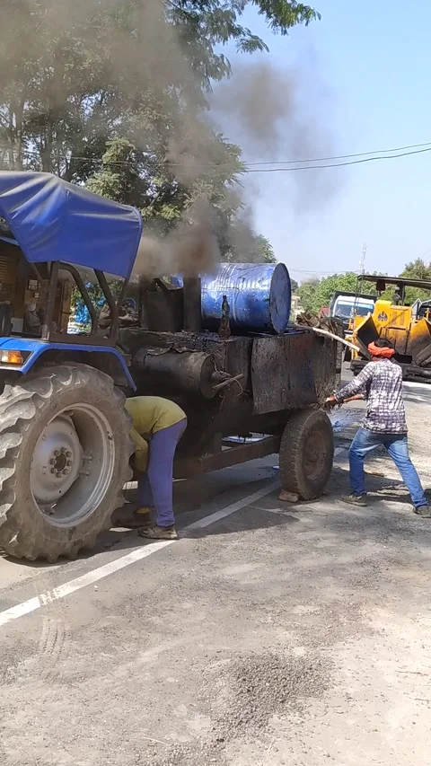 A labour worker is busy in making the road. Stock Footage 143328075