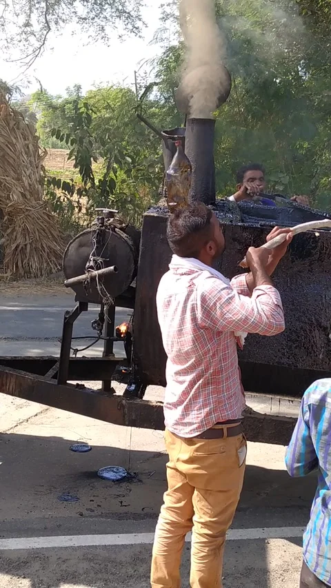 A labour worker is busy in making the road. Stock Footage 143328145