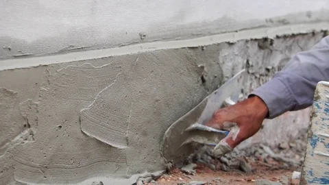 Labourer male plastering wall  Stock Footage 112946490