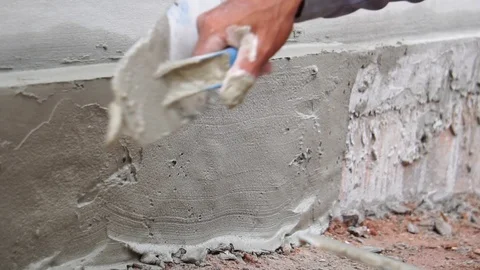 Labourer male plastering wall  Stock Footage 112946521