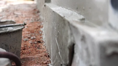 Labourer male plastering wall  Stock Footage 112946607