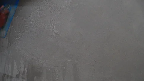 Labourer male plastering wall  Stock Footage 112949291