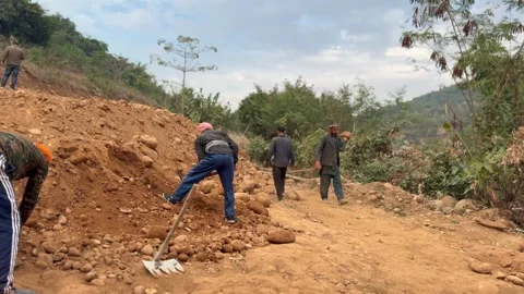 Labourers at work Stock Footage 324512308