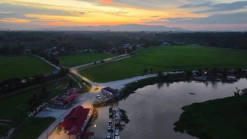 Labuh Banting River Jetty Sunset Over Rice Fields Video stock 329362132