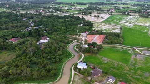 Labuh Banting Rural River and Rice Fields Aerial View Stock Footage 332213101