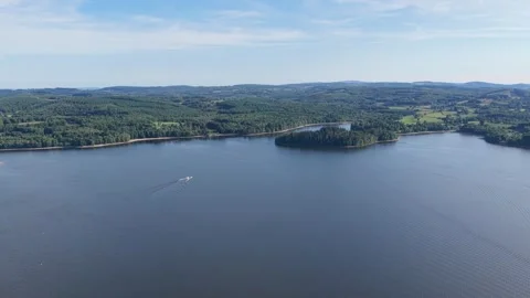 Lac des Settons, a large freshwater lake in the Morvan region of France, aerial Stock Footage 346698747