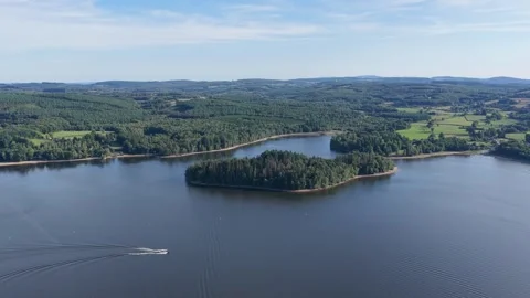 Lac des Settons in the Morvan region of France. The clip showcases a forested Stock Footage 346708478