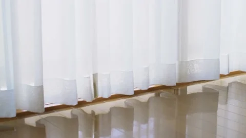 Lace curtain by the window swaying in the wind Stock Footage 154647019