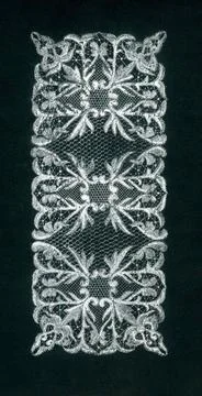 . Lace design of a garment in rectangle shape with elongated leafy motifs,... Stock Photos
