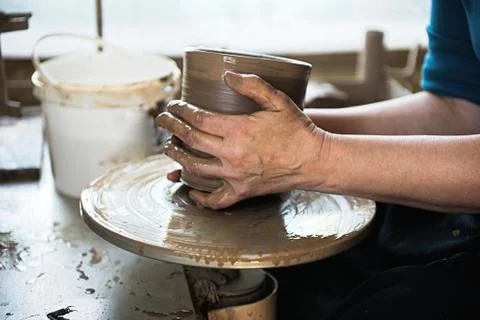 A lace maker and ceramicist create artwork Stock Photos