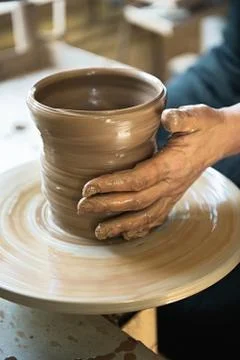 A lace maker and ceramicist create artwork Stock Photos