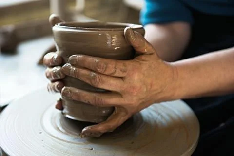 A lace maker and ceramicist create artwork Stock Photos
