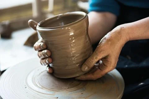 A lace maker and ceramicist create artwork Stock Photos