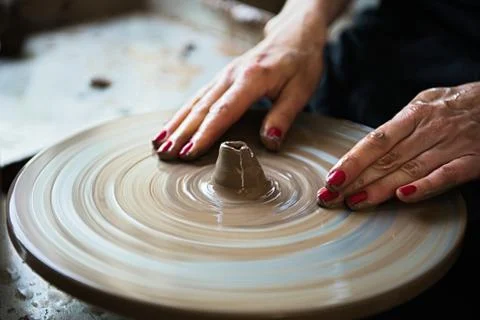 A lace maker and ceramicist create artwork Stock Photos